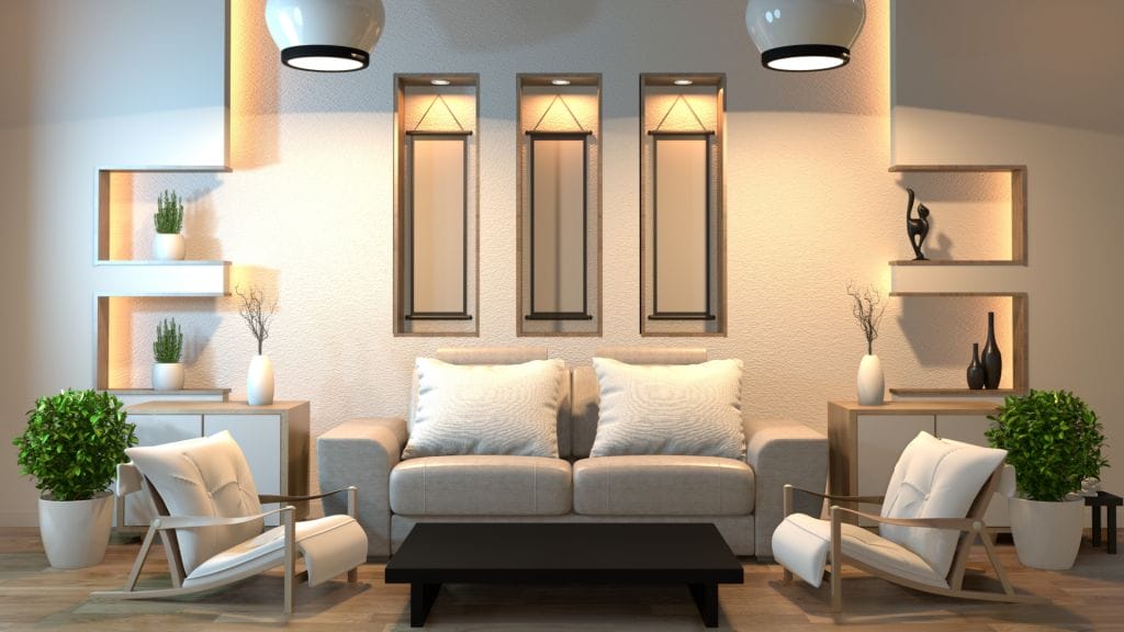 A modern living room with a sleek white sofa adorned with two large white pillows, flanked by two white armchairs with wooden frames. The wall features three vertical mirrors and built-in shelves holding decorative plants and vases. A black coffee table sits in front.