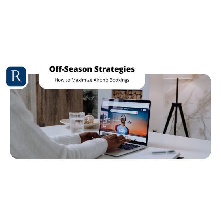 A person using a laptop on a white table, displaying an Airbnb booking page. The background reveals a modern, minimalistic room with a lamp and wooden elements. Text overlay reads "Maximizing Off-Season Bookings: How to Enhance Your Airbnb Strategy" with a blue icon featuring the letter 'R'.